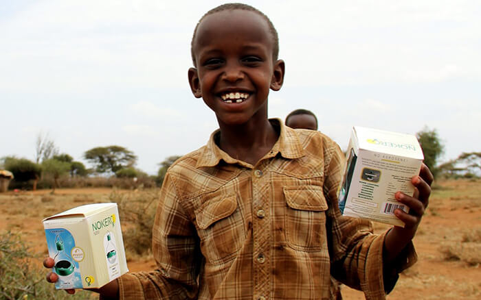 Happy Boy with Nokero Solar Powered Lamp