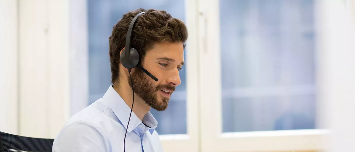 customer support person with headset